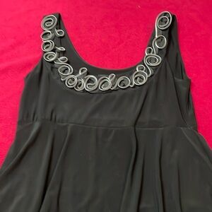 Tiana B Medium black layered  dress with swirling zipper design at neckline